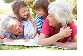 Grandparents in park with grandkids